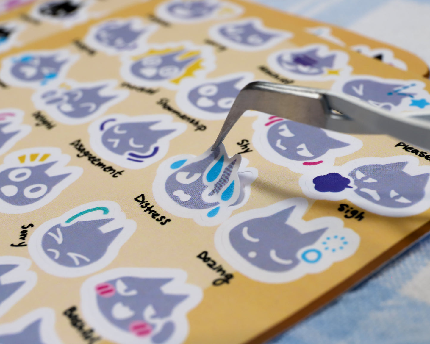 A sheet of stickers with various cat emotion icons, based on the emotional reactions in the Nintendo game Animal Crossing.
