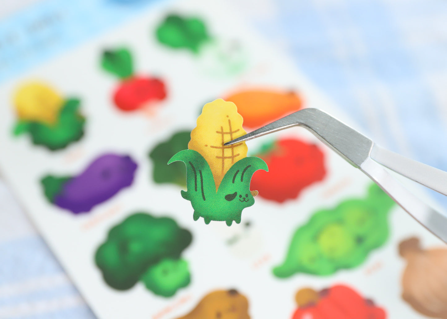 A sticker sheet with dogs turned into vegetables, stickers are designed by Reytorra, and are great for decorating planners and laptops.