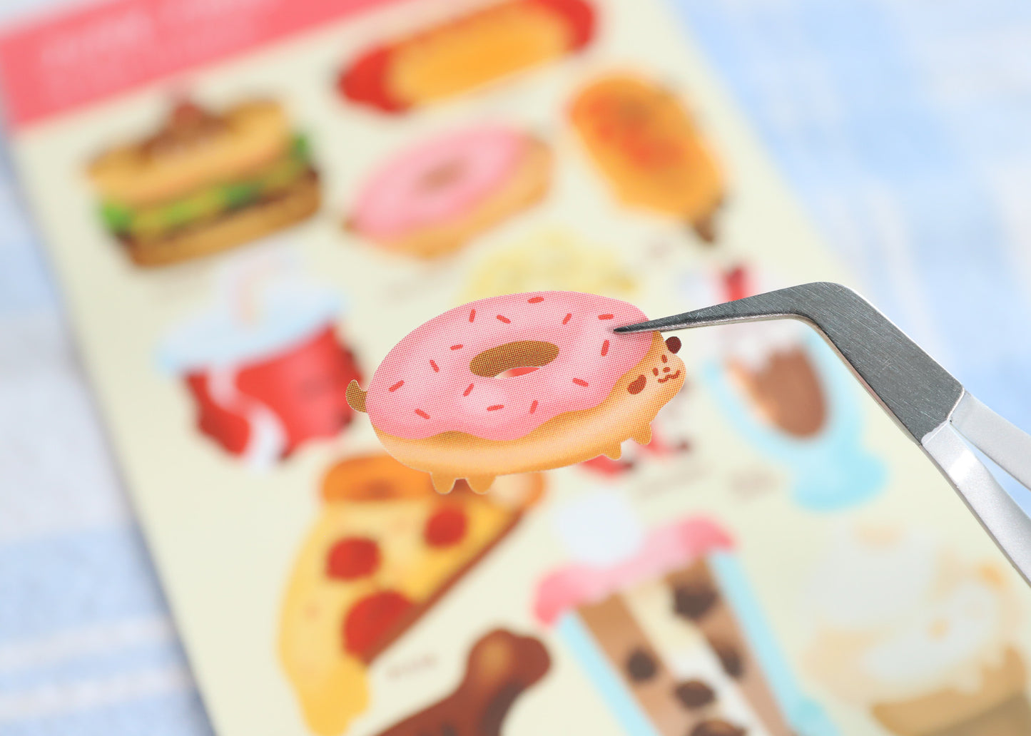 A sheet of stickers depicting various junk food items, such as a cheeseburger, fries, and ice cream. Great for decorating, journaling and scrapbooking!