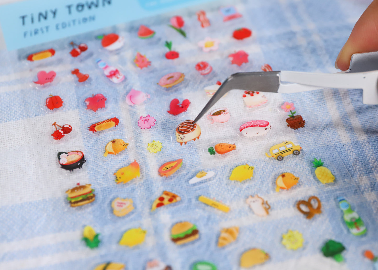 A sticker sheet with various small stickers featuring cute animal characters. The stickers are very small and can fit on your nails Prefect for deco, journaling and nail art.