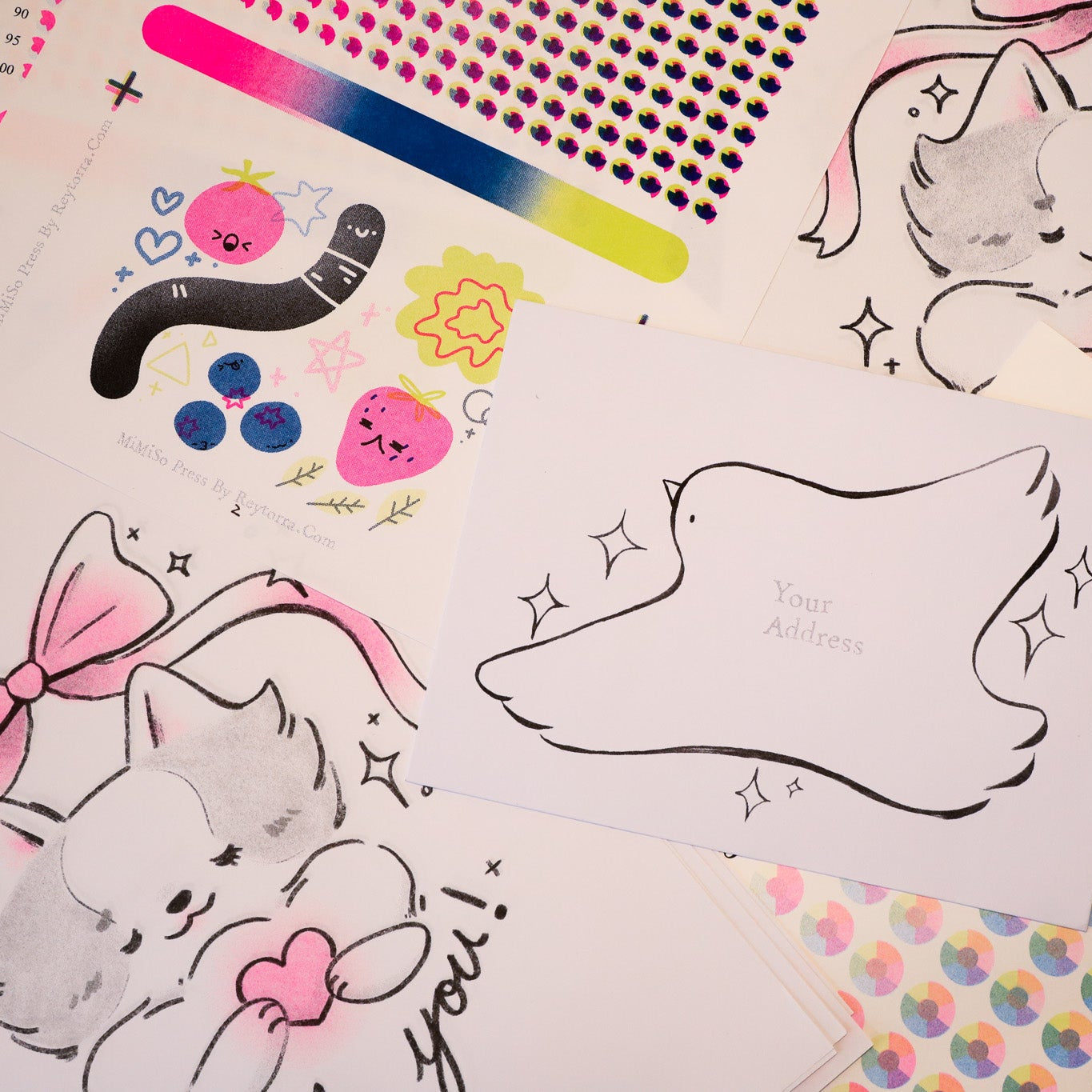 Sheet of paper with a black outline of a dog on a colorful background with cartoon characters and patterns.