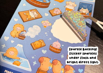 Sheet of stickers with cartoon characters on a blue background, featuring a glittery tool.